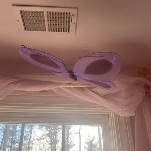 Decorative butterflies . These have invisible string and can hang from ceiling.